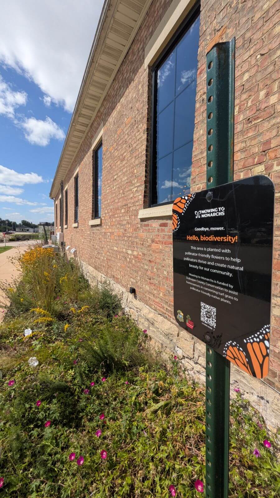 butterfly garden on the south side of brick building of Textile Brewing Company