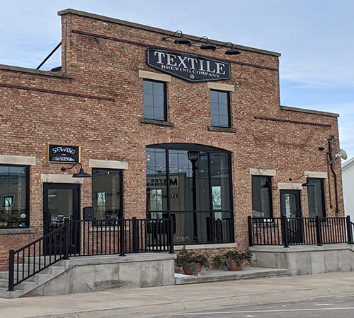 brick building with black trim accents
