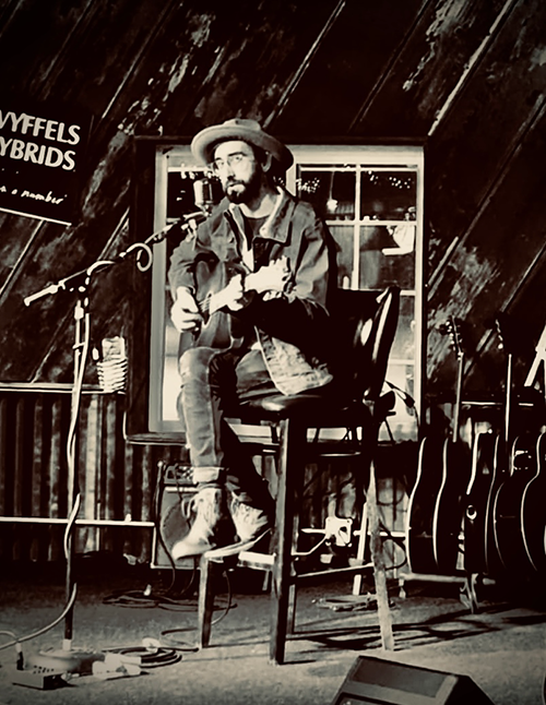 Logan Strong performing on stage