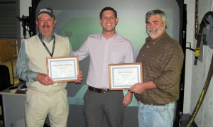 Graig Jolley from the USMC CPAC (middle) presented Dennis Rosenberry (left) and Dale Alleman (right) with their instructor certifications.